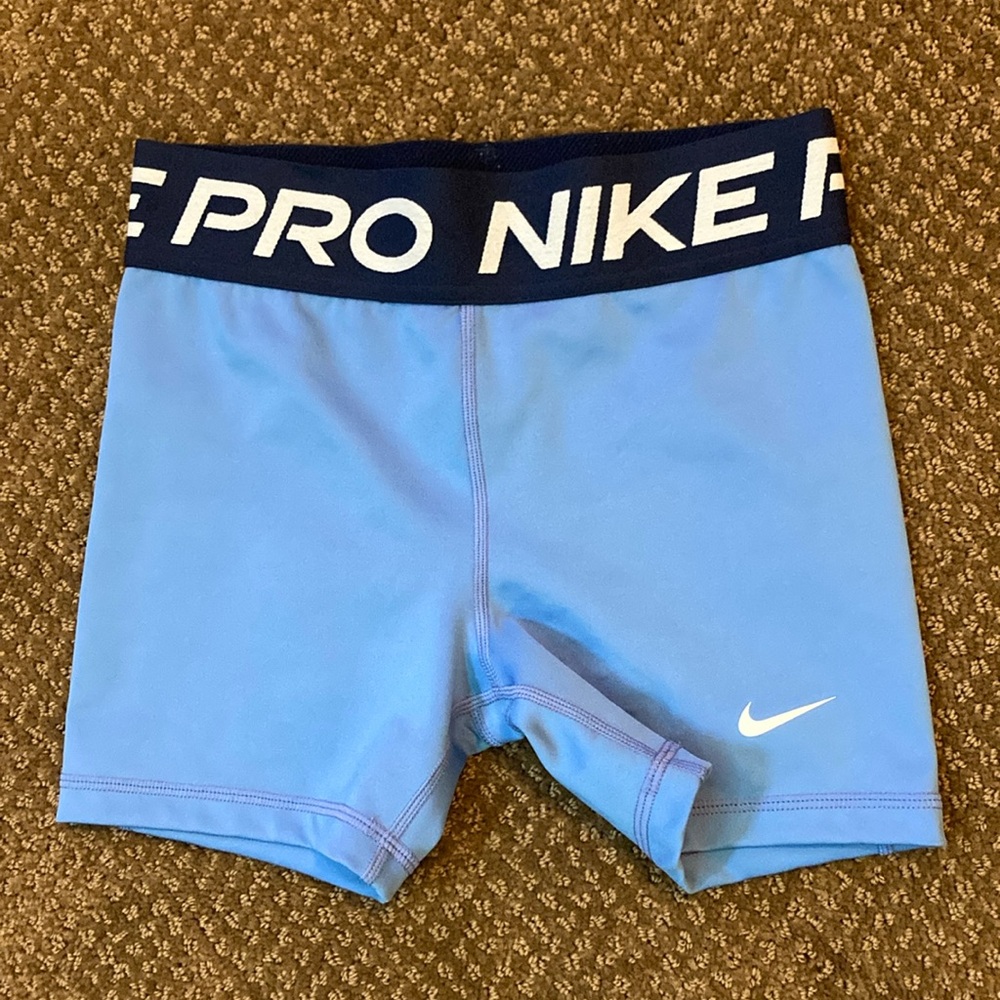 Light blue Nike pro shirt spandex size youth medium